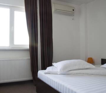 Фото номера Двухместный номер с 1 кроватью и собственной ванной комнатой Мотели Motel Alexander г. Olteniţa 7